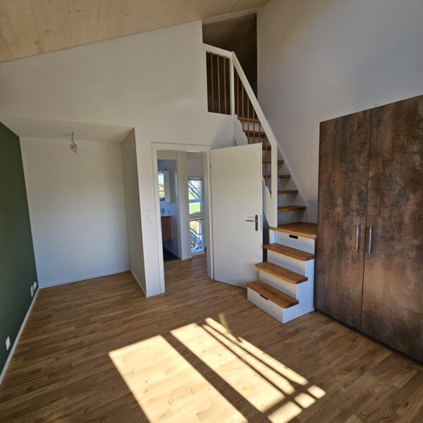 Schlafzimmer mit Estrichtreppe