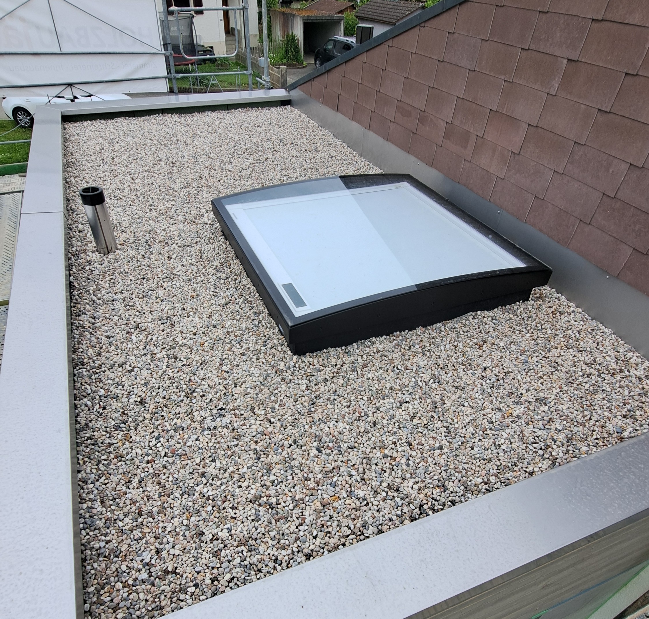 Flachdach Anbau mit Dachfenster